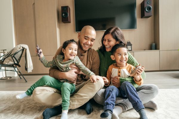 Happy family at home on winter holidays Happy family at home on winter holidays