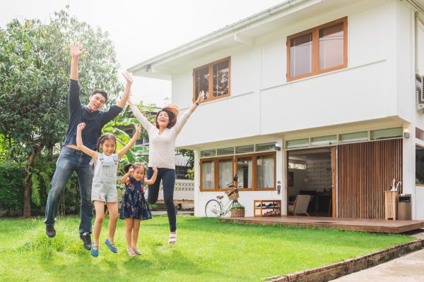 Portrait Asian family front of house, happy family home concept Portrait Asian family front of house, happy family home concept